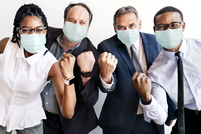 Successful-business-people-wearing-face-masks-work