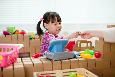Toddler-girl-pretend-play-shop-keeper-at-home-2025-10-15-21-19-33-utc